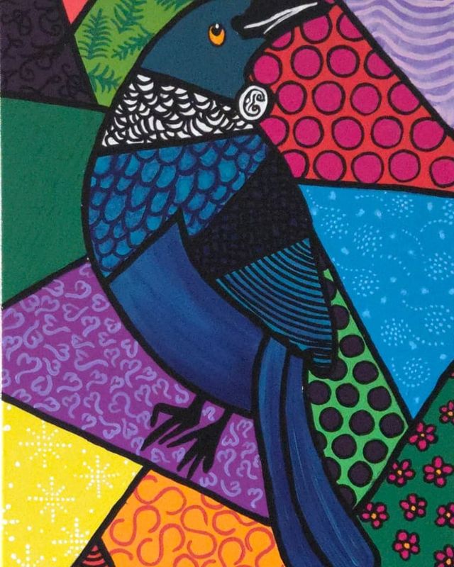 A tūī in blues with a white throat tuft and an orange eye, perched upright on a tall narrow canvas of patterned shards in red, green, purple, yellow and orange, every shape outlined in black.